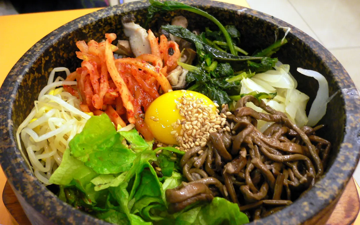 Dolsot bibimbap served in a hot stone bowl.